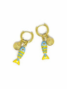 Pair of gold-tone huggie hoops, each with a pale blue and yellow fish charm and a gold-tone scallop shell