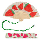 Open fan with a cream leaf printed with red strawberries, green cord and printed gift box below