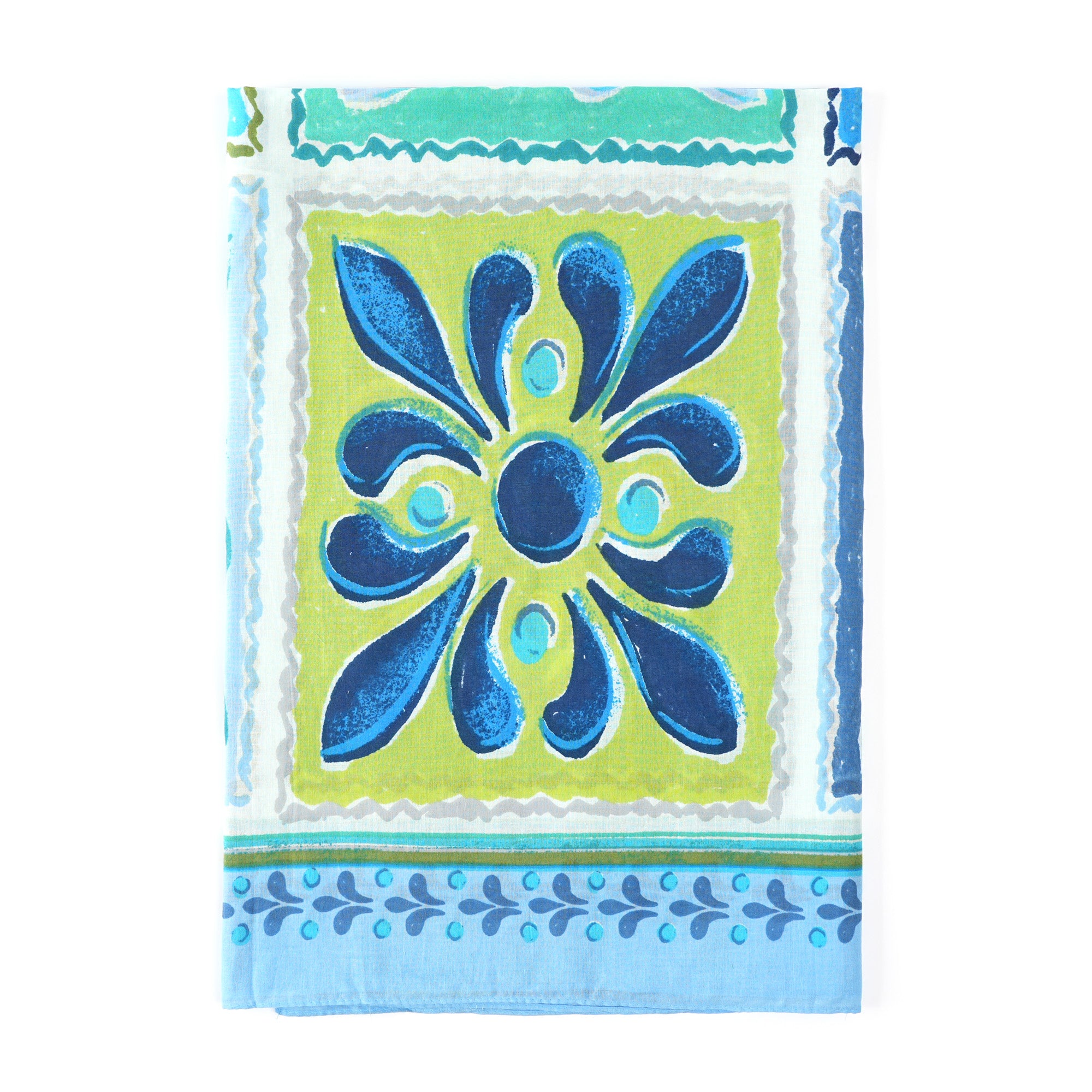 Corner detail of the blue tile print with a leaf border