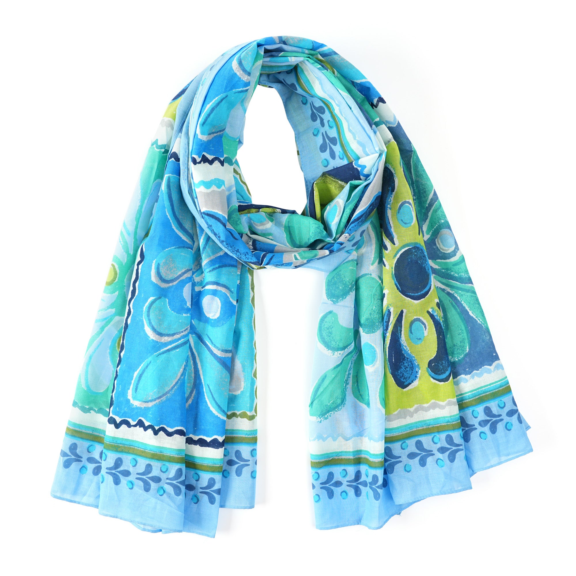 Cotton scarf in a blue and green tile print, draped in a loop