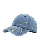 Mid-wash blue denim baseball cap embroidered with small yellow lemons, shown from the front with a curved brim.