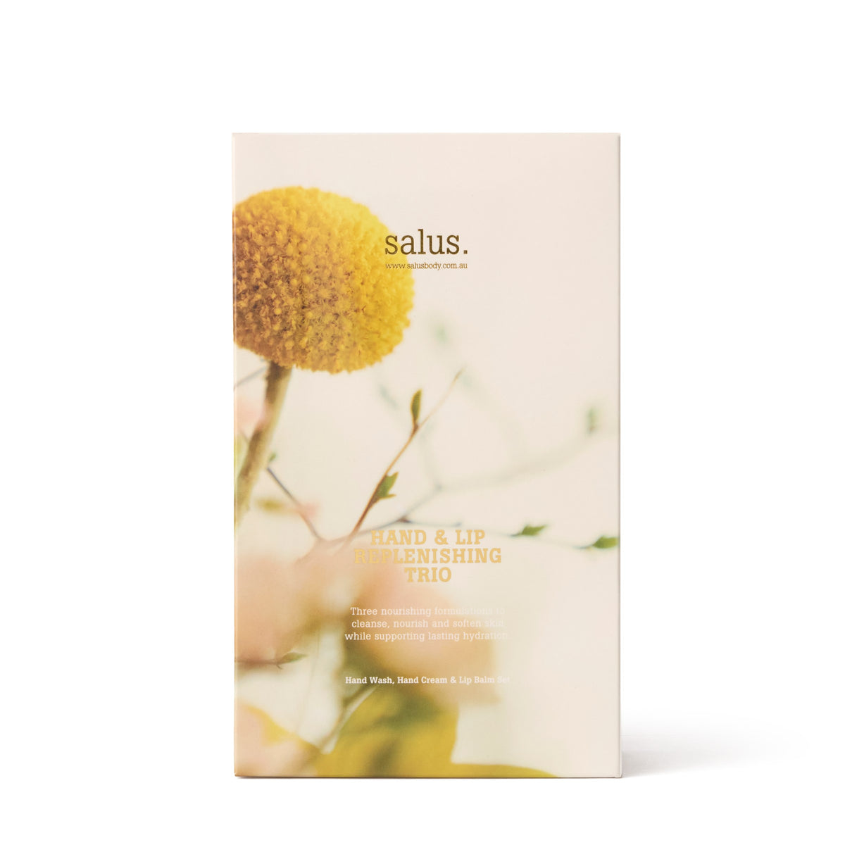 Salus Hand & Lip Replenishing Trio gift box, cream with a yellow wildflower photograph on the front.
