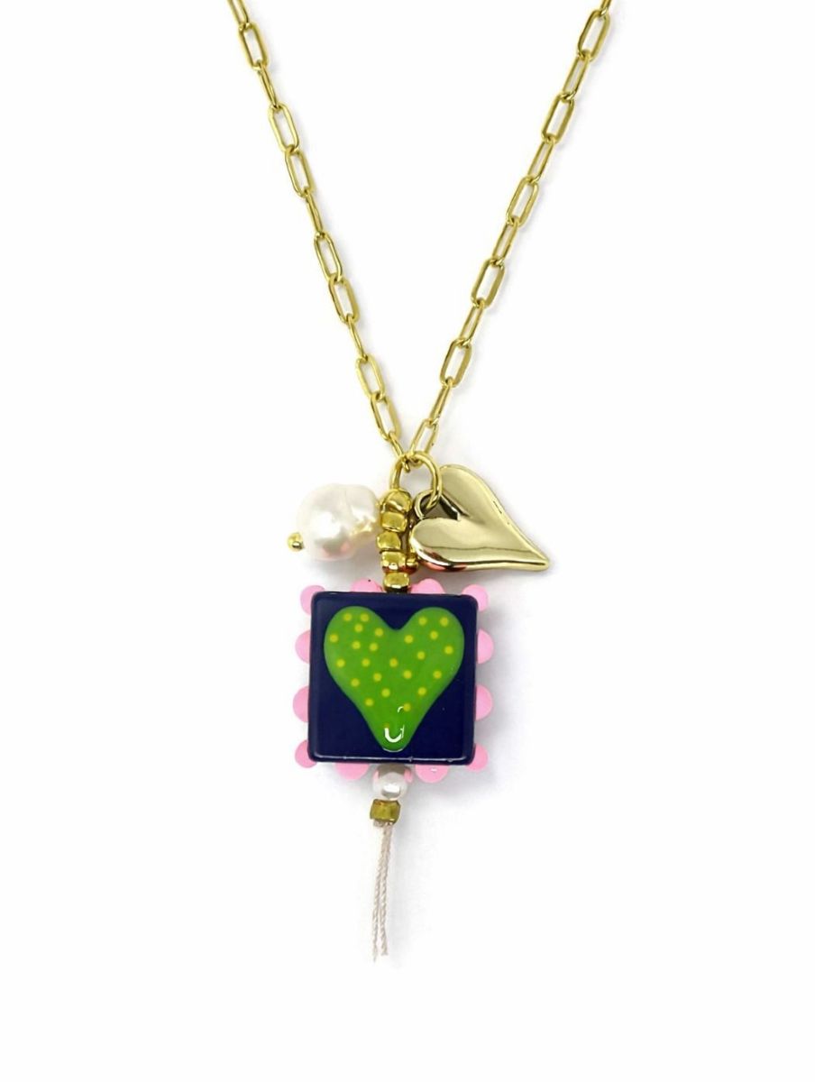 Gold-tone paperclip chain with a navy square tile with a lime heart and pink scalloped edge, a gold-tone heart and pearl-look beads