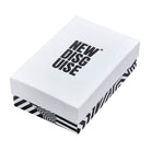 New Disguise gift box: a white lid with the brand name in black, over a black and white striped base.
