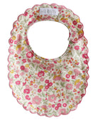 Back of the scallop floral bib showing the neck opening and fastening