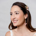 Jasmine hair clip worn above the ear