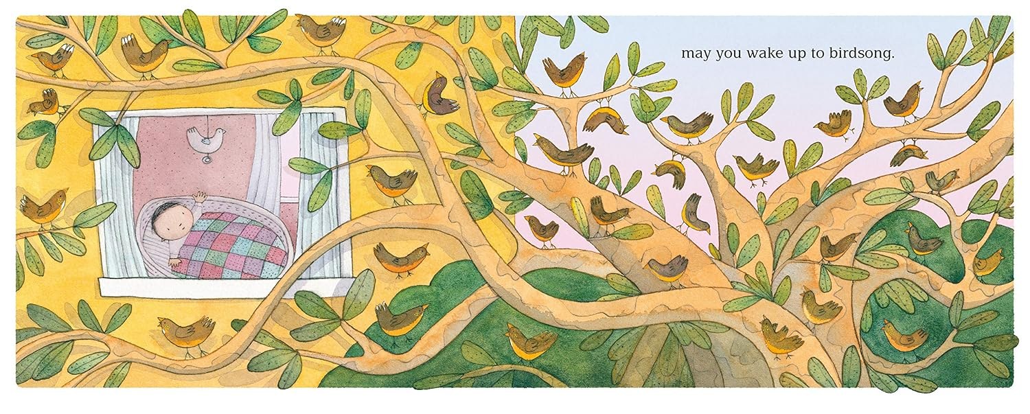 An inside spread of Kissed by the Moon: a baby among the branches of a golden tree.