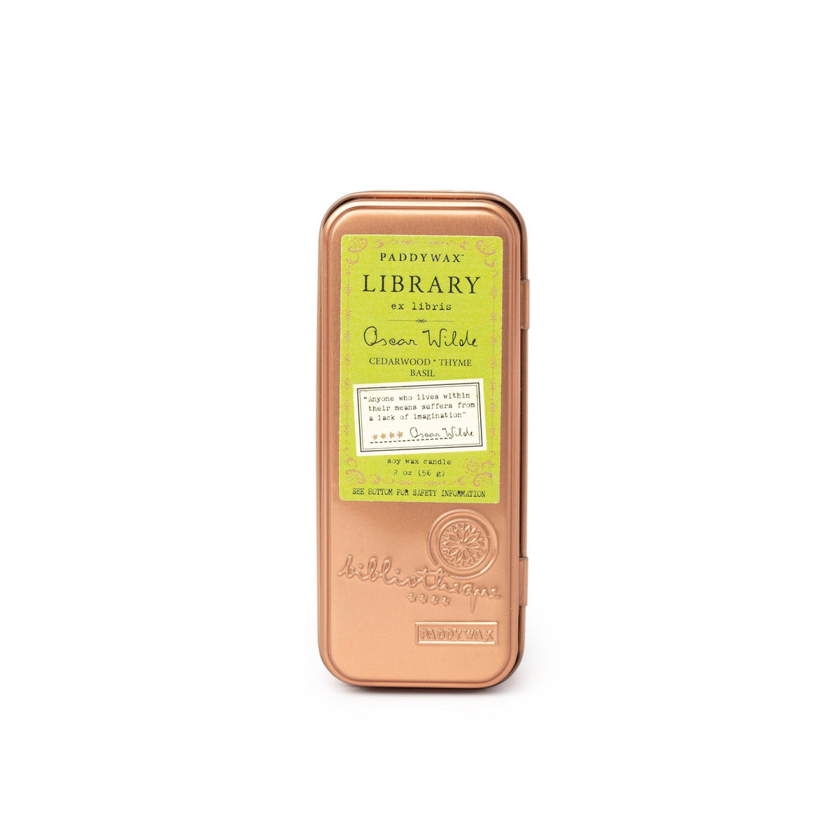 The Oscar Wilde travel tin closed, front on: a copper tin with a lime green label.