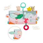 The soft book opened to a page with a lift-up leaf flap, captioned with crinkle and squeak labels.