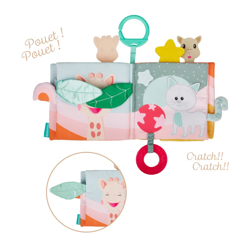 The soft book opened to a page with a lift-up leaf flap, captioned with crinkle and squeak labels.