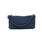 The other side of the woven bag, the braided handle laid across the front.