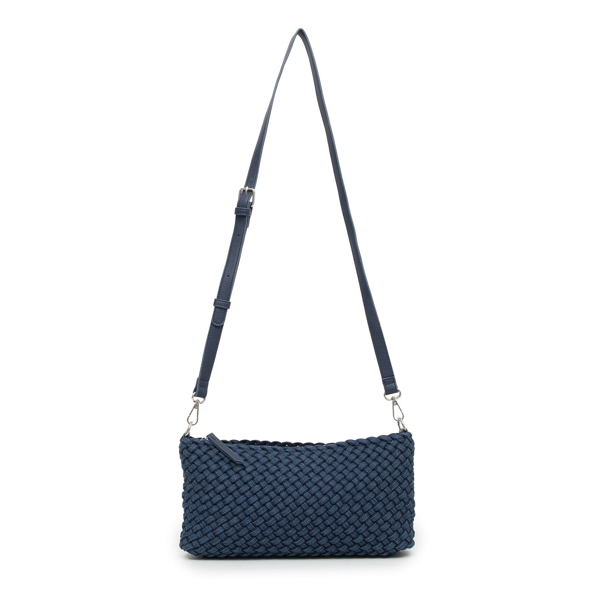 The woven bag hanging from its long strap, seen from the front.