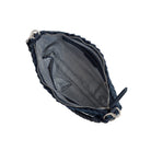 Inside the woven bag: the zip top open over a striped cotton lining.