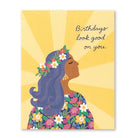 Birthdays Look Good on You card of a woman with a flower crown against golden sunburst rays