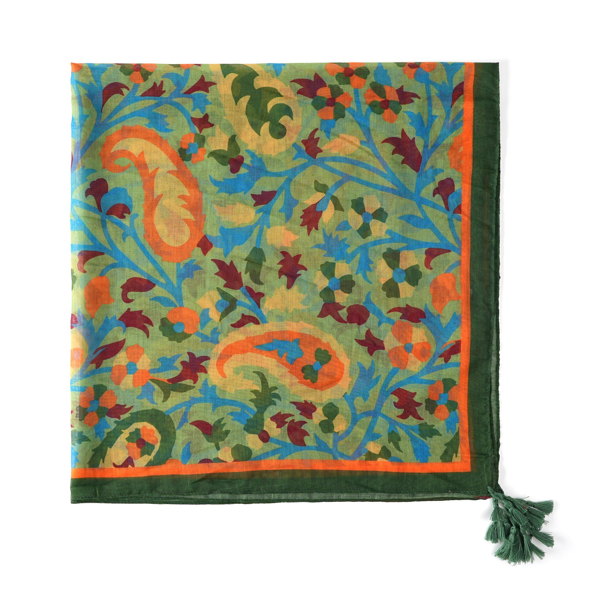 Corner detail of the paisley print with a green tassel