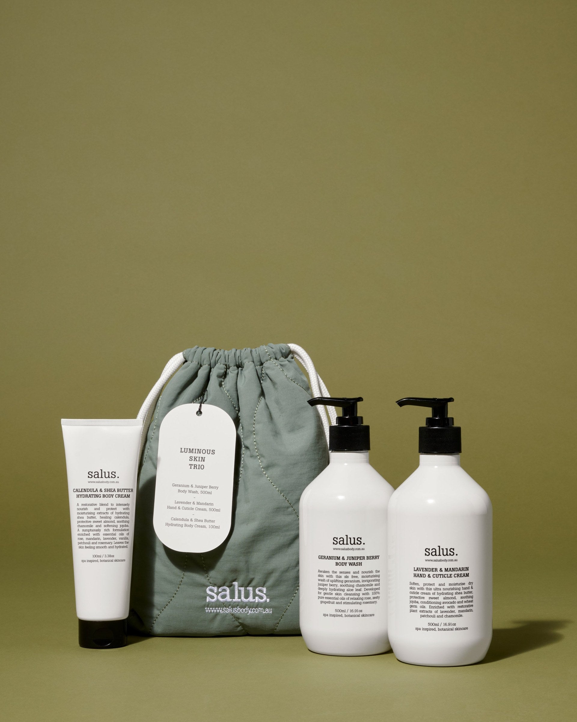 The drawstring bag with the three products standing around it on an olive backdrop.