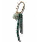 Gold carabiner keyring with two strands of green stone beads and a pale green flower charm