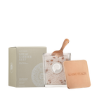 Great Barrier Reef Fragranced Bath Salts in a ribbed glass jar with a copper-coloured scoop, beside its copper-coloured lid and box