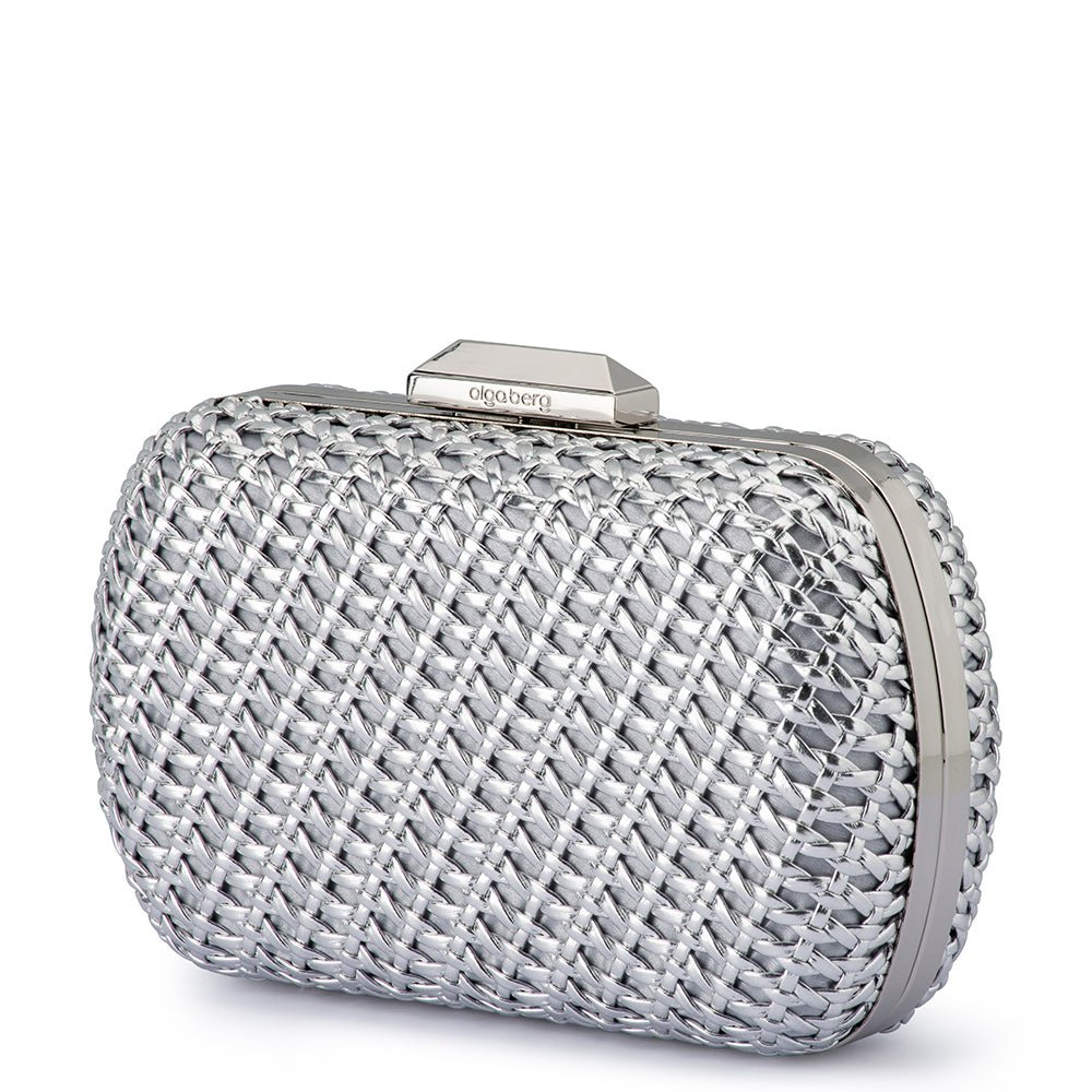 Silver woven clutch at a three-quarter angle, showing the polished frame along the side