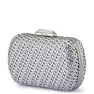 Silver woven clutch at a three-quarter angle, showing the polished frame along the side
