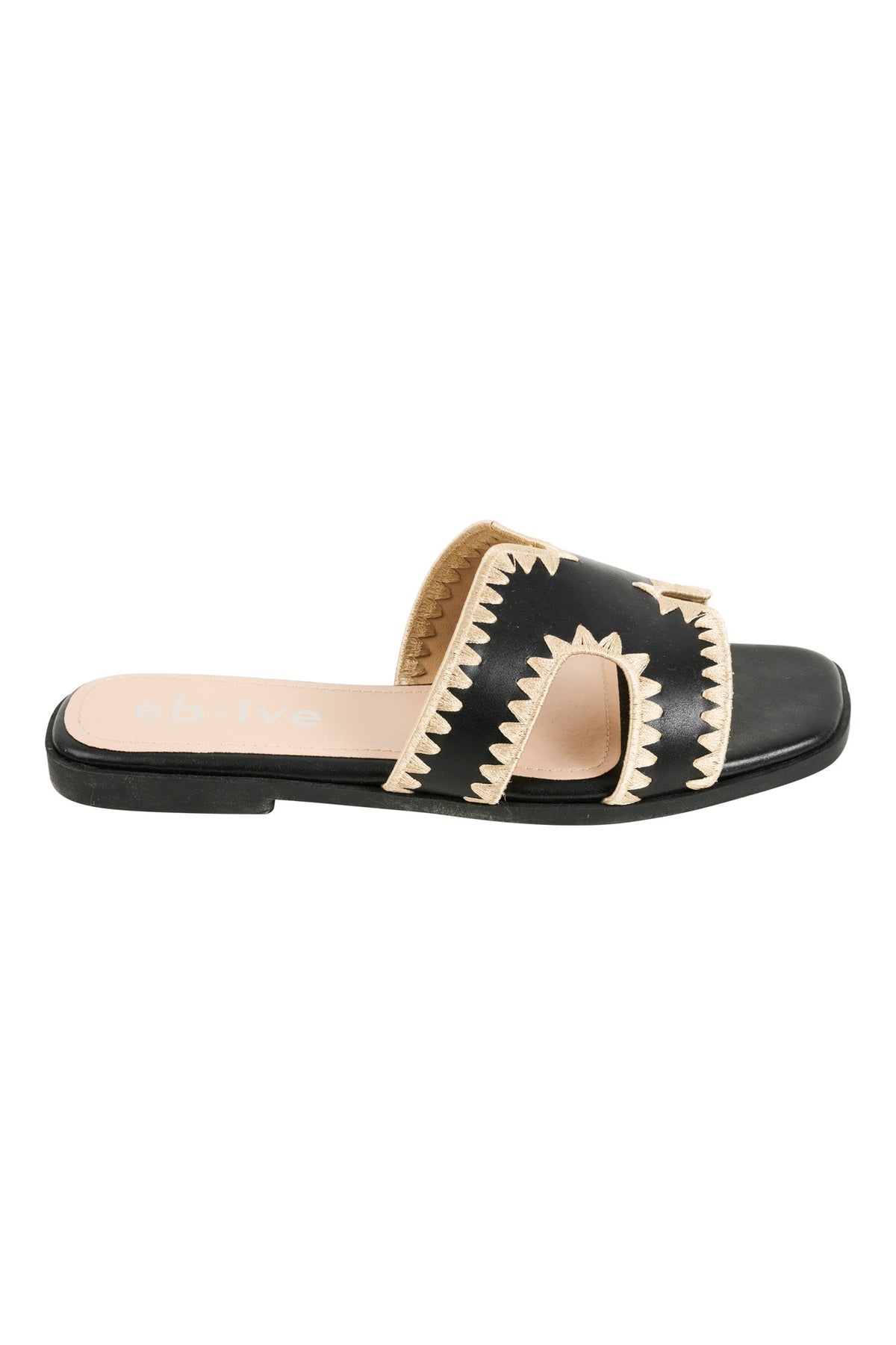 Side view of a black Maris slide, showing the flat sole and stitched strap