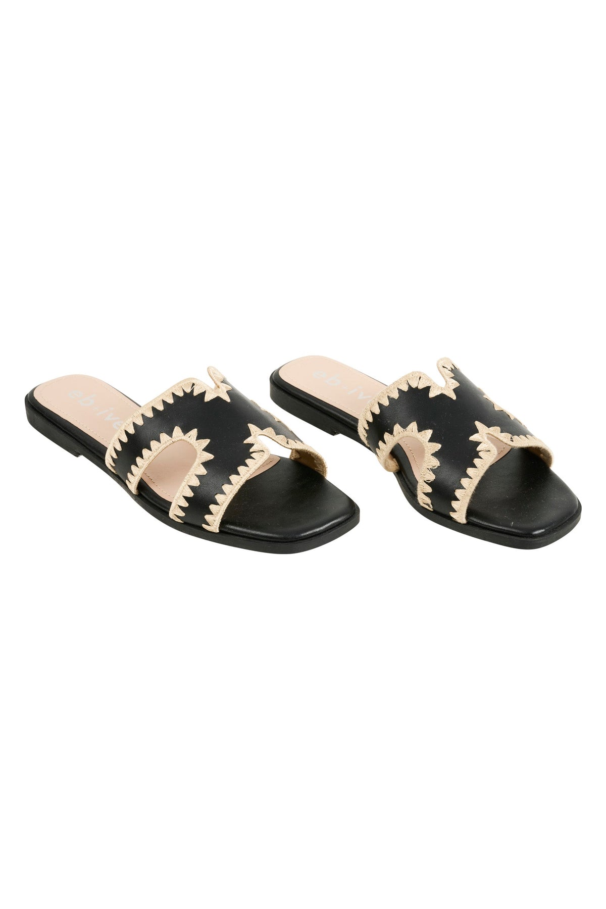 Black Maris slides at an angle, showing the squared open toes