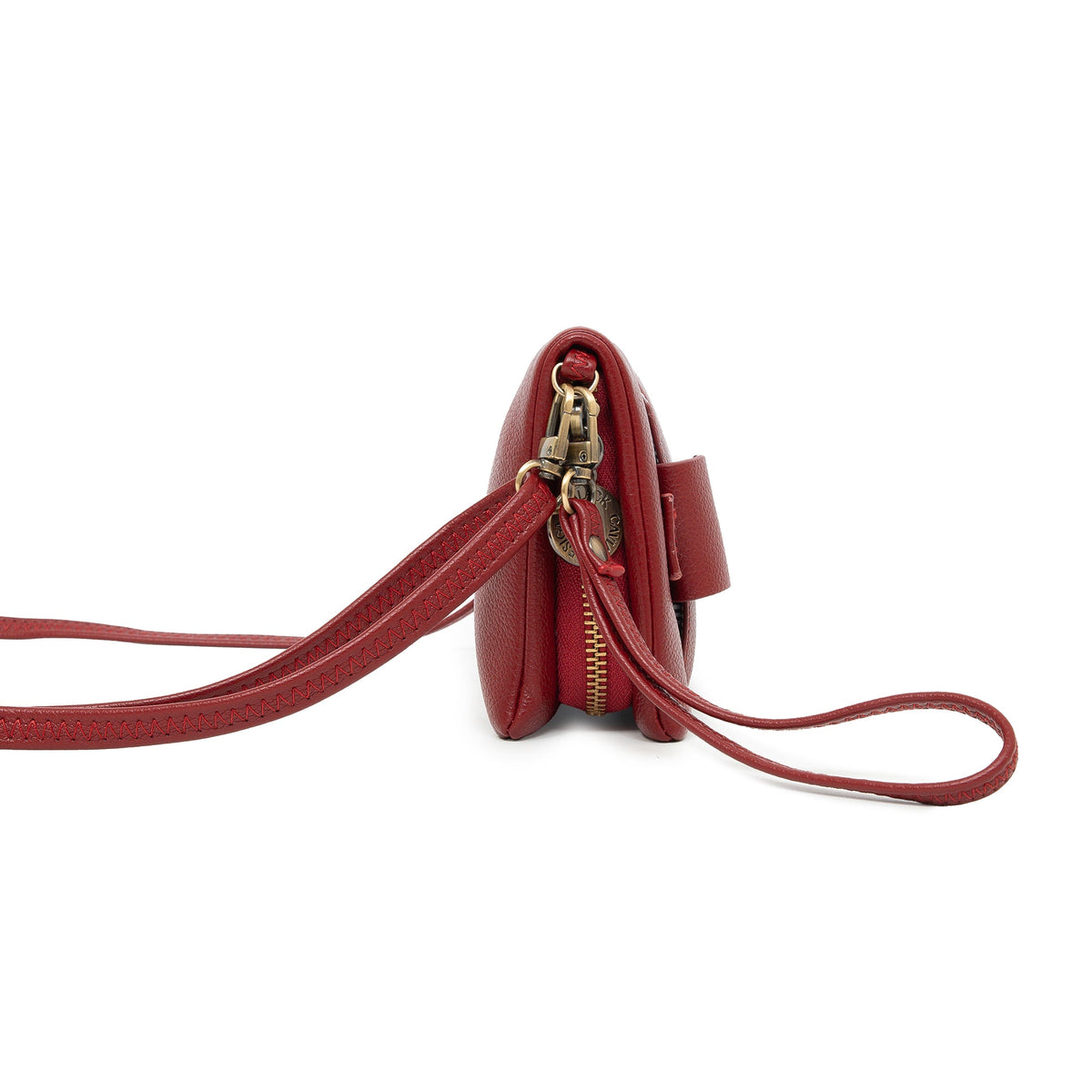End view of the red wallet, showing its zipped sections and the tab pocket.