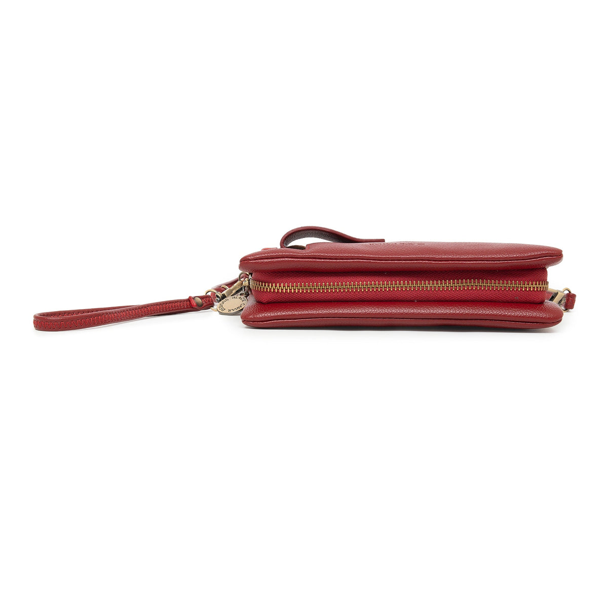 The red wallet lying flat, showing the gold zip that runs around it.
