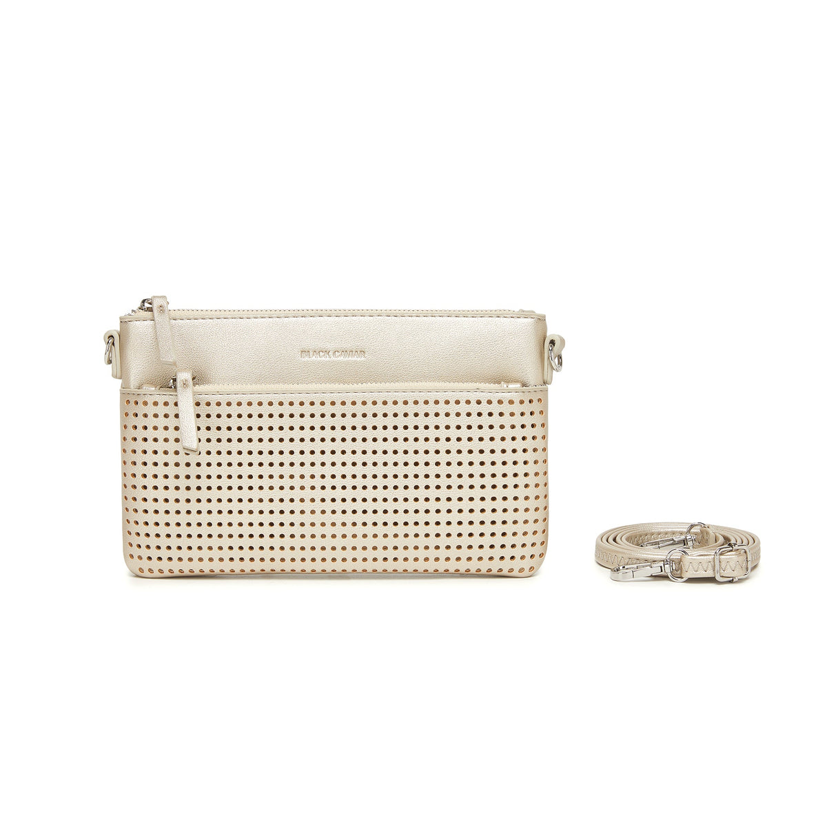 The gold clutch with a strap coiled beside it.
