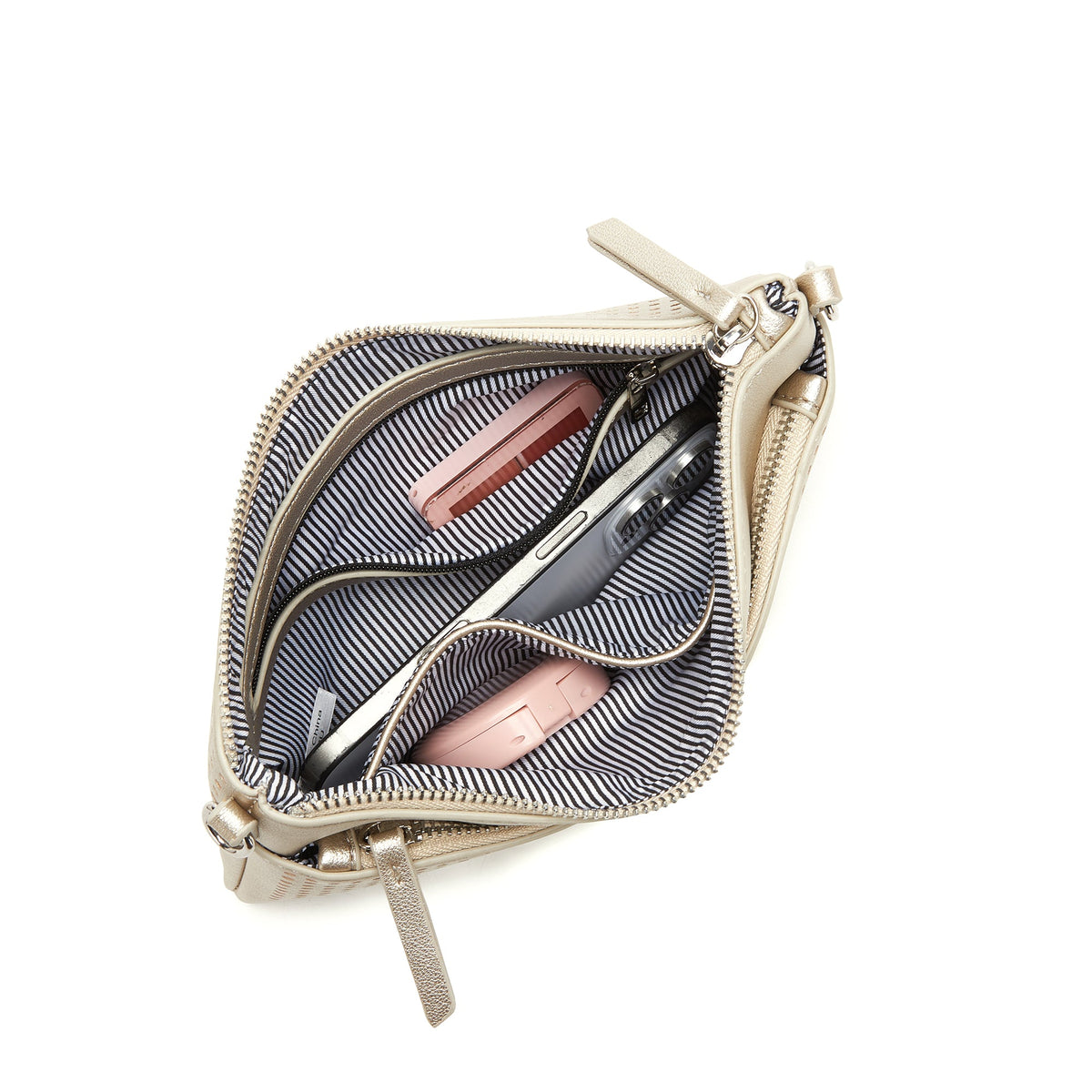 The open clutch holding a phone and two small pink compacts.