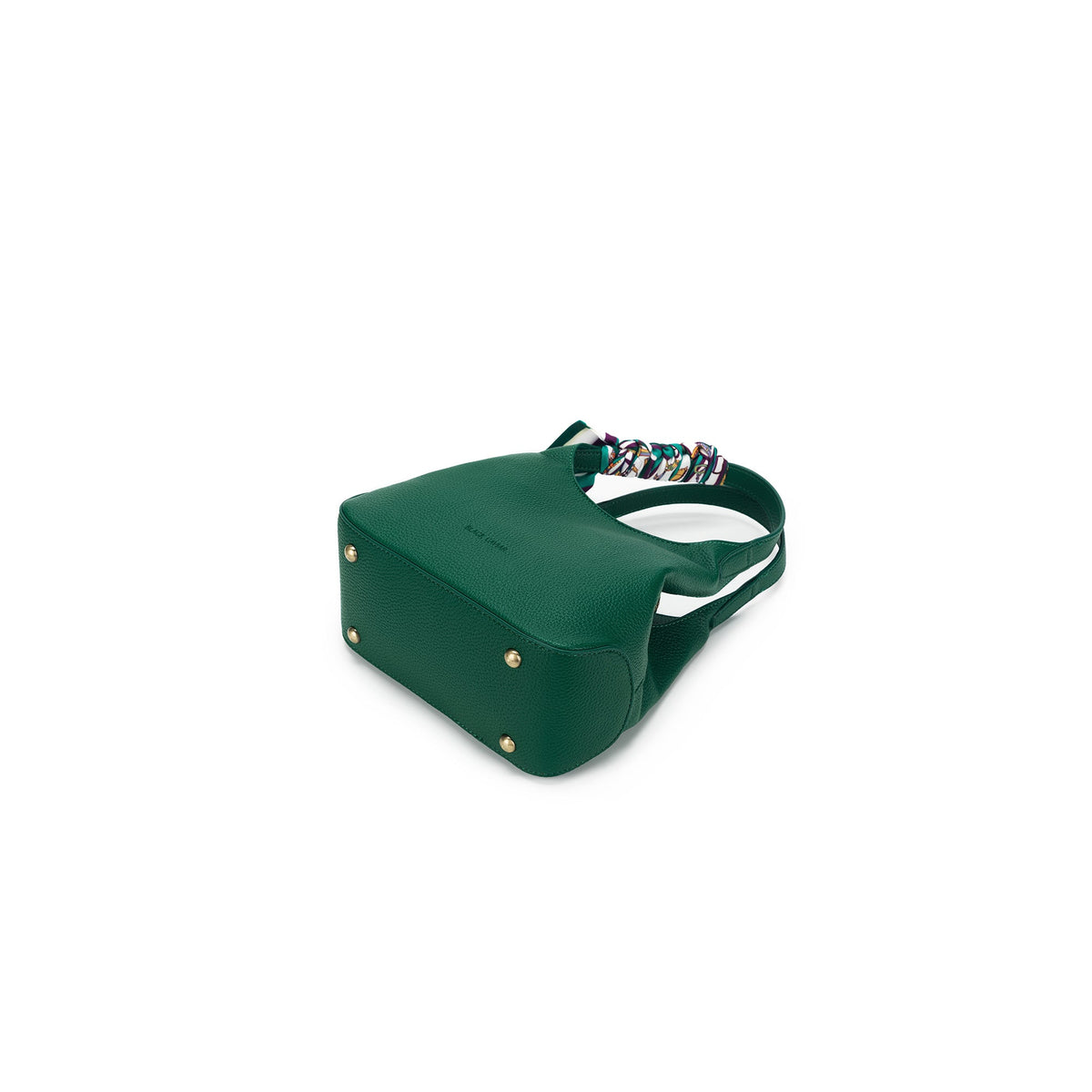 The green bag from below, showing four gold-tone feet on its base.