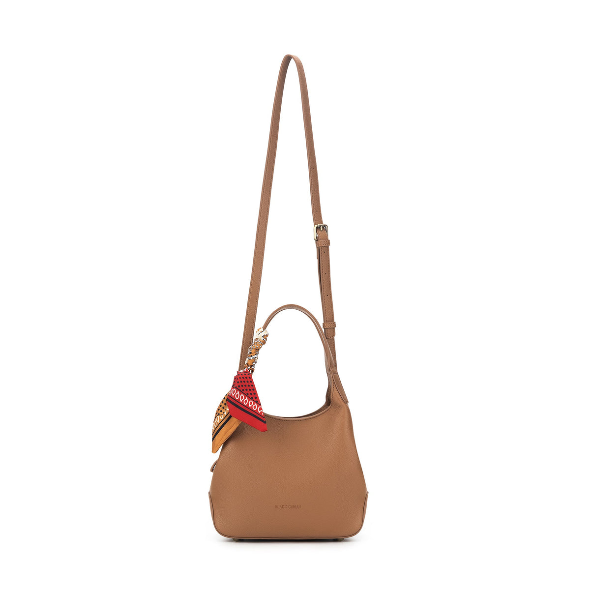 The mocha bag hanging from its long adjustable strap.
