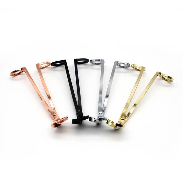 Fan of Mojo wick trimmers in rose gold, black, silver and gold