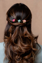 Marples hairpins styled in curled hair