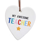 White ceramic heart printed with My Awesome Teacher in rainbow letters and a yellow star, on a brown cord