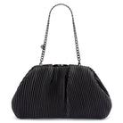 The pleated clutch carried from a short gunmetal curb chain with a round logo tag