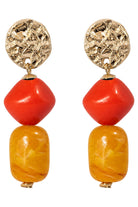 Palmera Sunset drop earrings: a hammered gold-tone disc above a red-orange and an amber marble-look bead