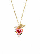 Gold-tone paperclip chain with a pink heart charm with a red centre, a gold-tone heart, a pearl-look bead and a short tassel
