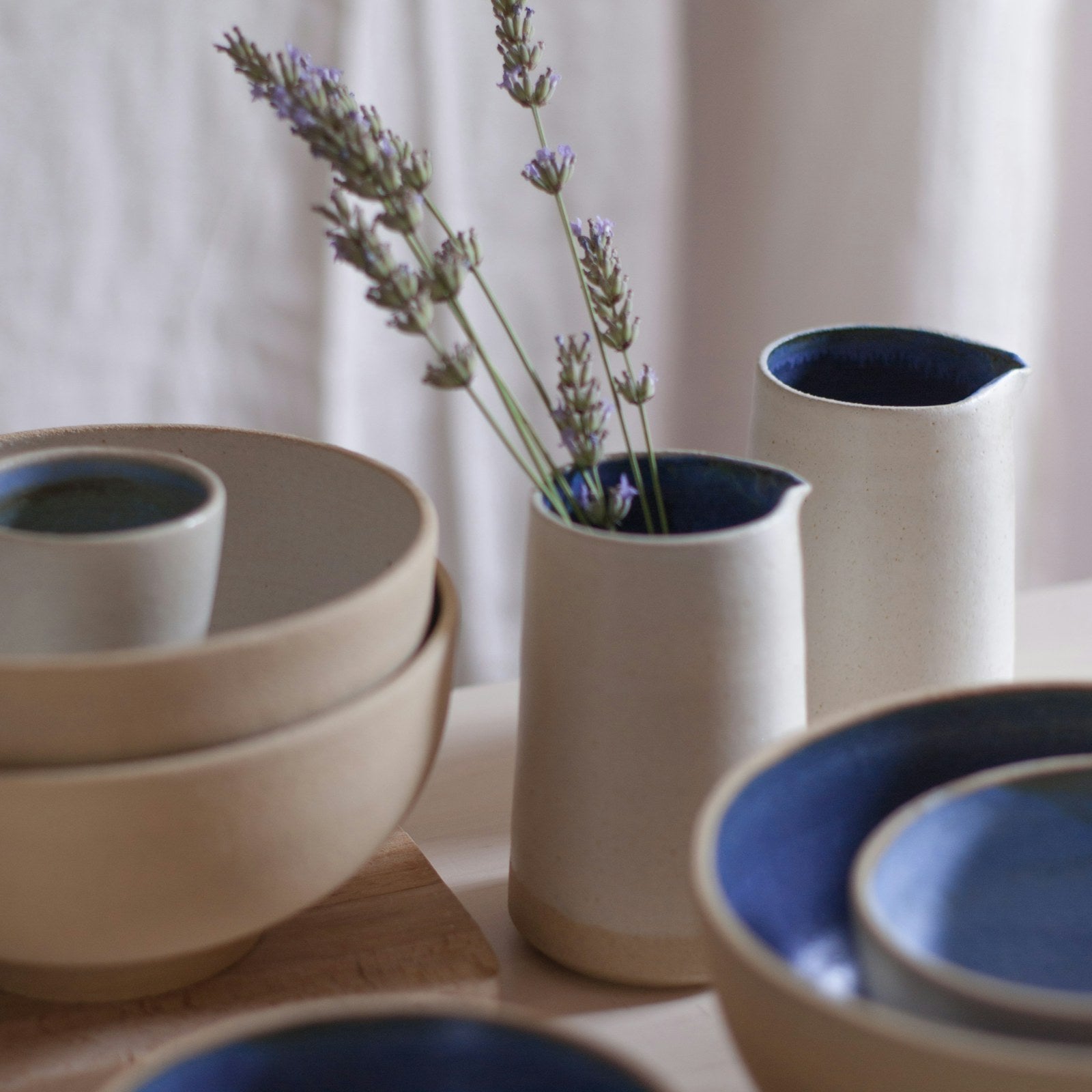 Cream and blue ceramics with lavender sprigs