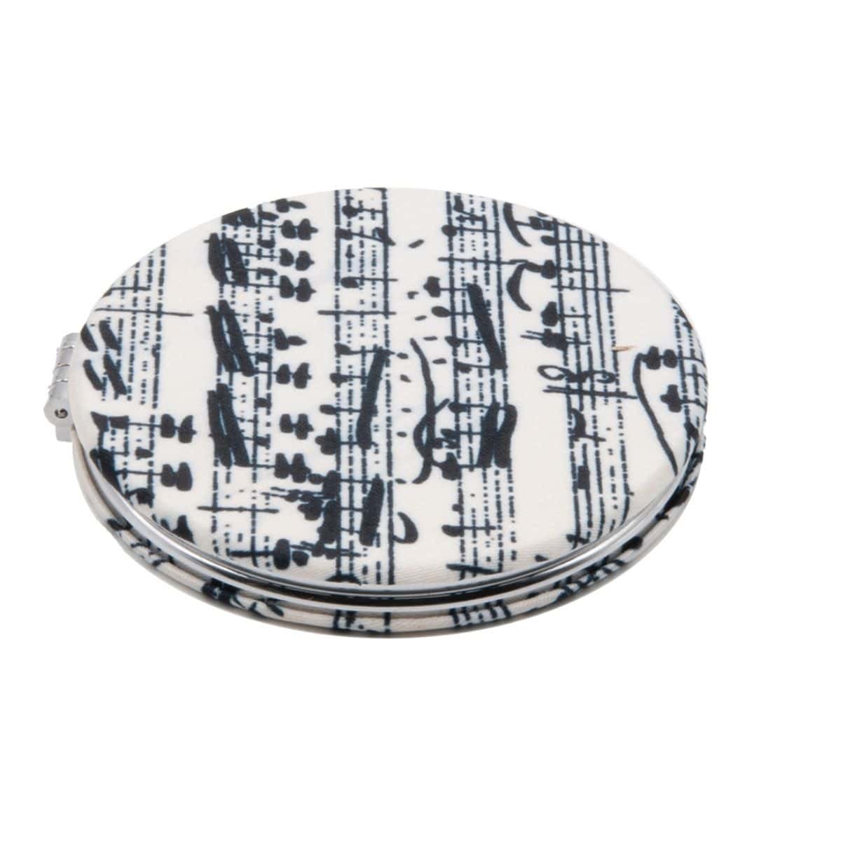 Folding pocket mirror covered in black handwritten sheet music on a cream ground.