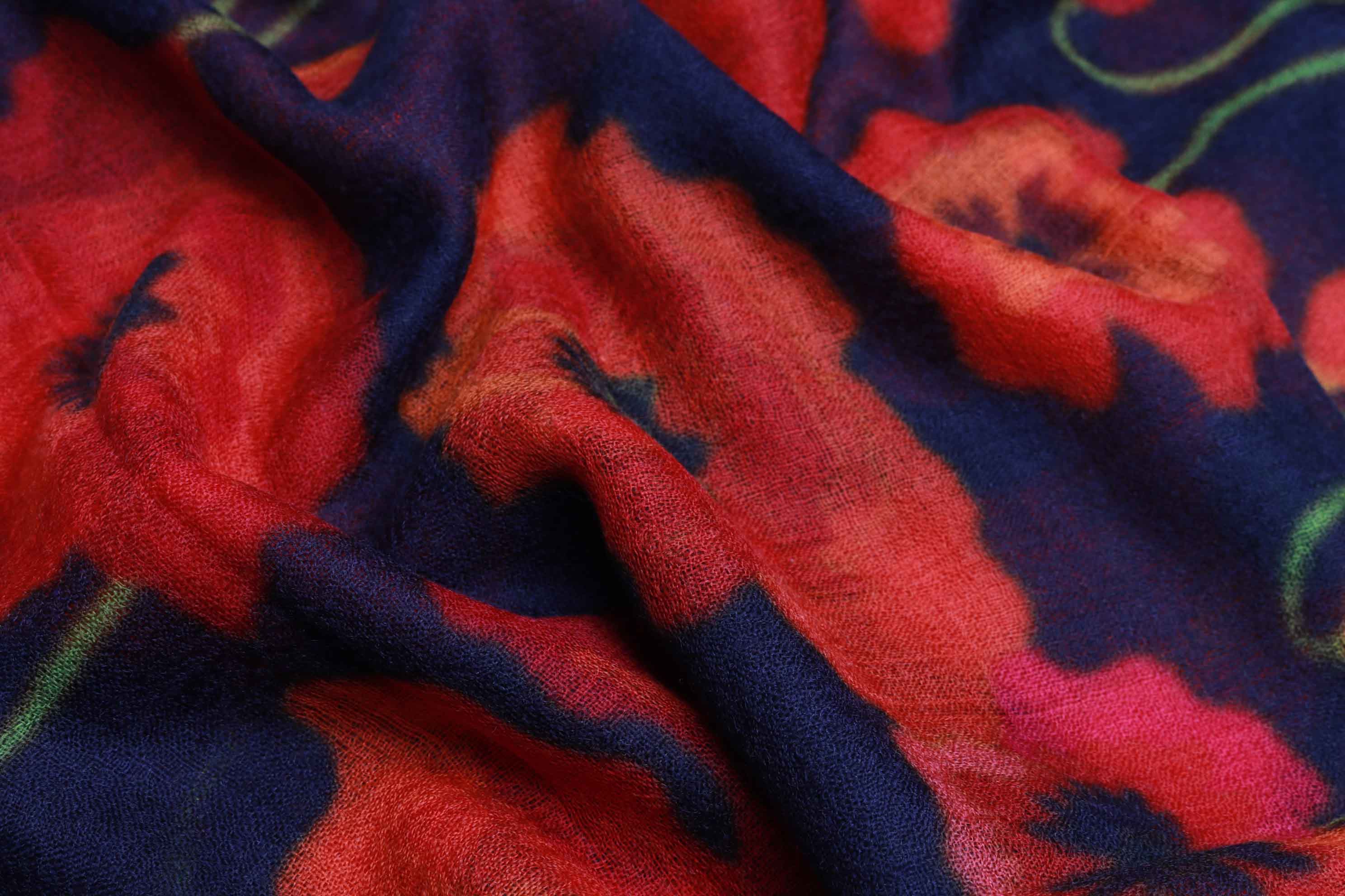 Close-up of the Poppy Bloom print, red poppies on deep navy