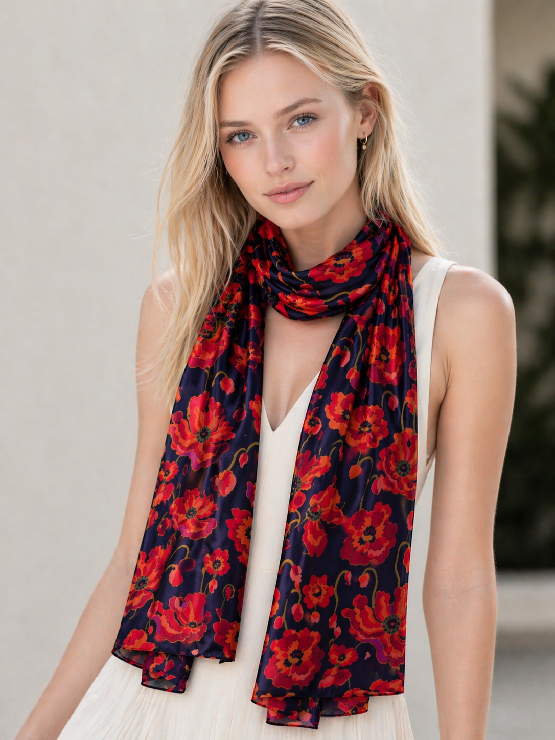 Poppy Bloom cotton modal scarf worn draped around the neck over a white top