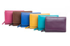 Small leather wallets in a row in pink, brown, cobalt, yellow, aqua and purple