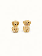 Pair of golden puppy stud earrings, each puppy sitting with floppy ears and paws together