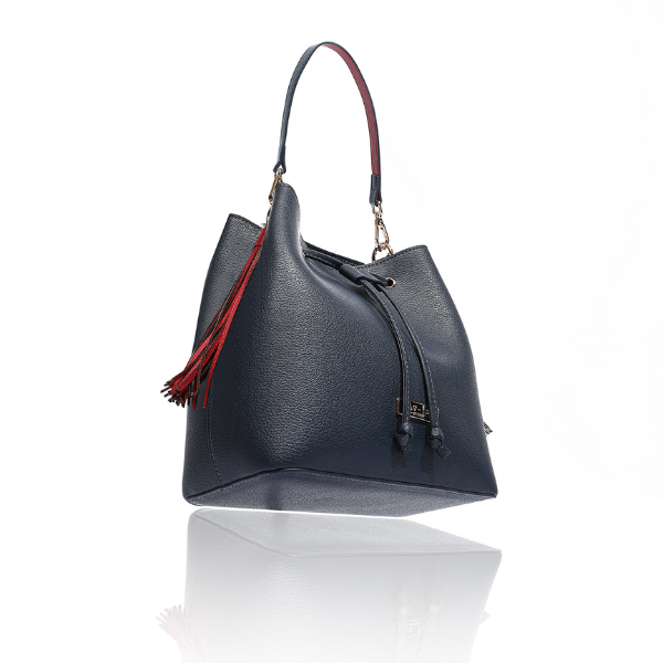Navy Ruby bucket bag with red tassels at the side and gold-tone hardware