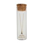 Selina gold-plated sterling silver letter A initial necklace in its cork-topped glass gift tube