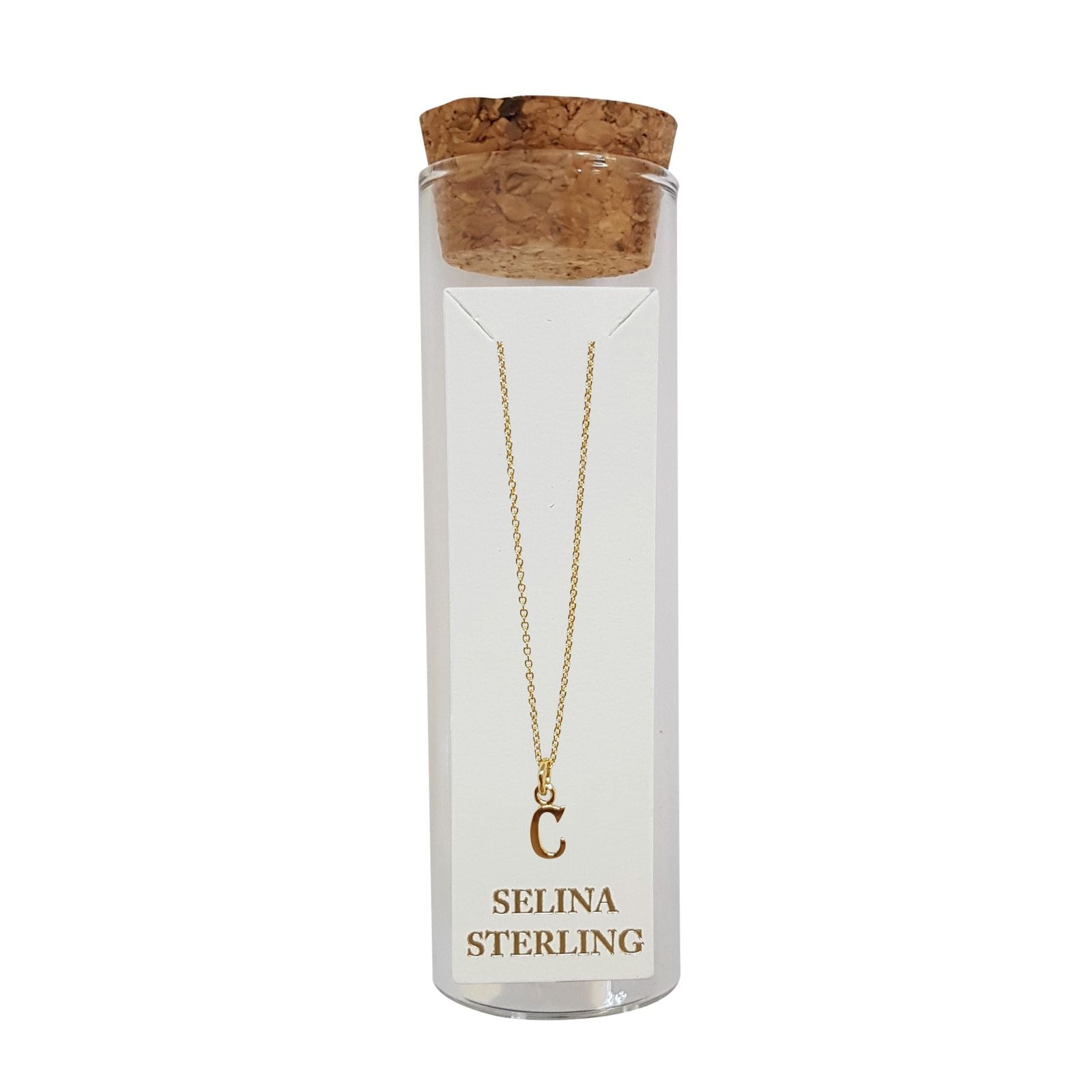 Selina gold-plated sterling silver letter C initial necklace in its cork-topped glass gift tube