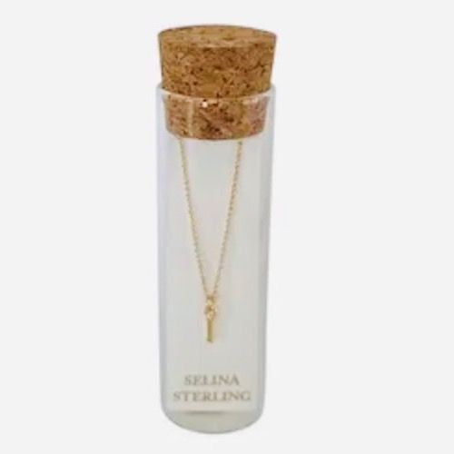 Selina gold-plated sterling silver letter I initial necklace in its cork-topped glass gift tube
