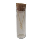 Selina gold-plated sterling silver letter Q initial necklace in its cork-topped glass gift tube