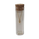 Selina gold-plated sterling silver letter W initial necklace in its cork-topped glass gift tube